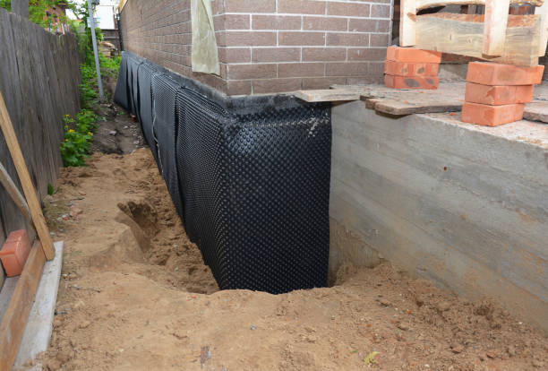 Happy homeowners after waterproofing job in Kewanna